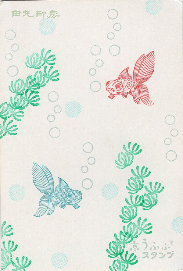Poisson rouge face à gauche